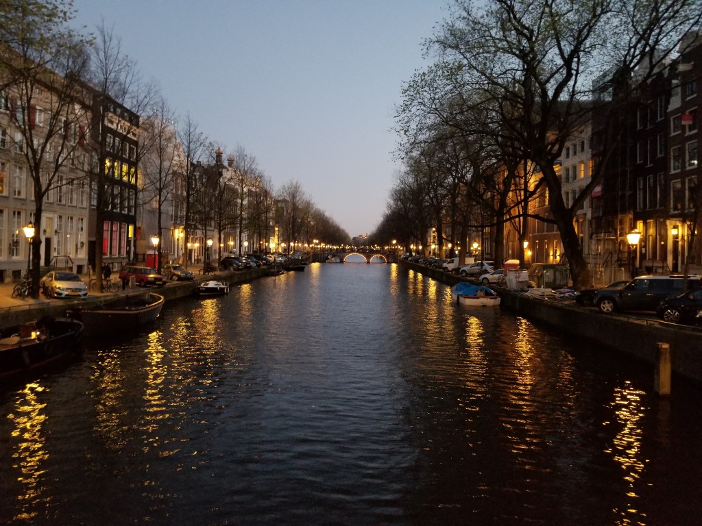 nighttime view of canal in Amsterdam
